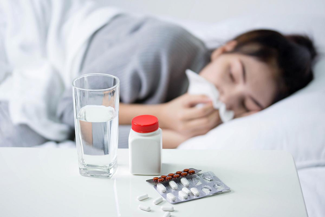 Các phản ứng phụ có thể xảy ra khi tiêm vắc-xin cúm - ảnh 1