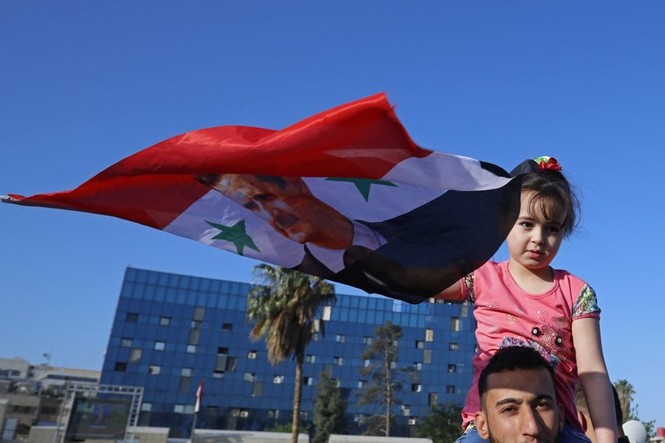 Người dân Syria xuống đường phản đối Mỹ - ảnh 2