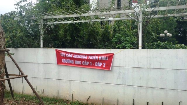 Cư dân căng băng rôn phản đối Gamuda Gardens lật kèo - ảnh 5