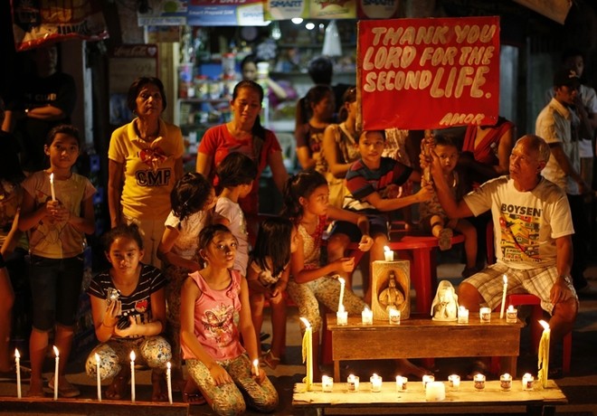 Philippines tưởng niệm 1 năm sau thảm họa bão Haiyan - ảnh 9