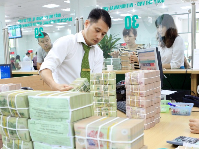 Thống đốc: Giải phóng nợ xấu, tạo điều kiện cho doanh nghiệp vay vốn - ảnh 1