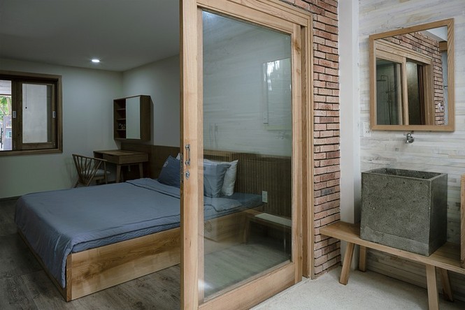 Nhà ống 3 tầng tường gạch không trát độc đáo - ảnh 10
