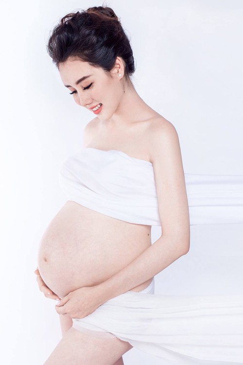 Vợ của đạo diễn Ngô Quang Hải khoe ảnh đẹp long lanh - ảnh 1
