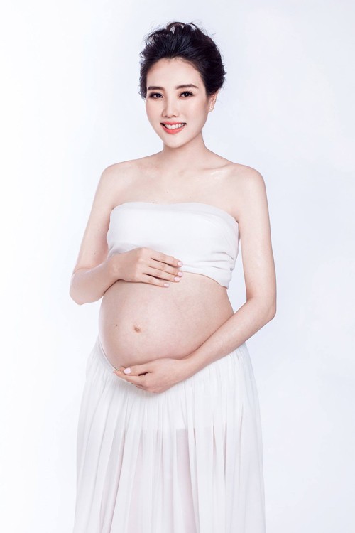 Vợ của đạo diễn Ngô Quang Hải khoe ảnh đẹp long lanh - ảnh 4