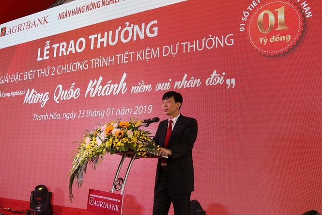 Agribank trao thưởng sổ tiết kiệm 1 tỷ đồng cho khách hàng trúng độc đắc - ảnh 1