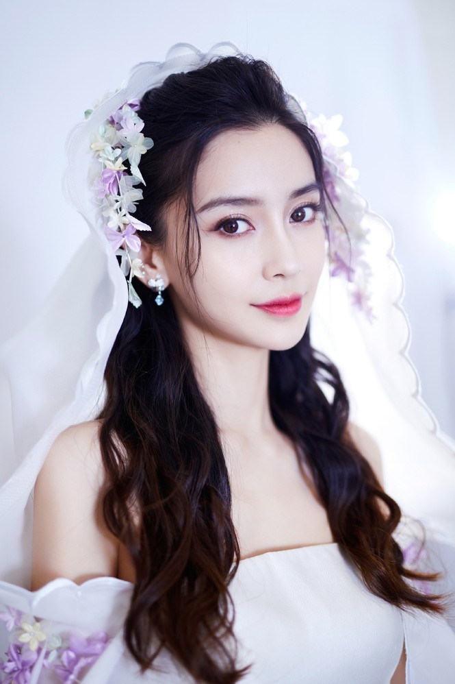 Angela Baby hết ‘trễ nải’ vòng một lại khoe eo bé xíu ngày đầu năm mới - ảnh 12