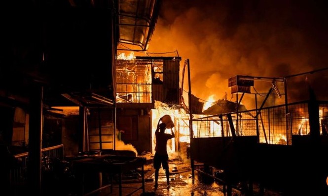 Kinh hoàng hàng nghìn ngôi nhà bị thiêu rụi trong một đêm - ảnh 1