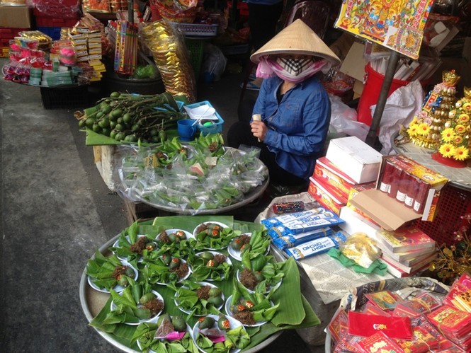TPHCM: Người dân tấp nập mua đồ cúng ngày vía Thần tài - ảnh 7