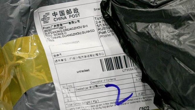 Nhận bưu phẩm gửi từ Trung Quốc có nguy cơ nhiễm virus corona không? - ảnh 1