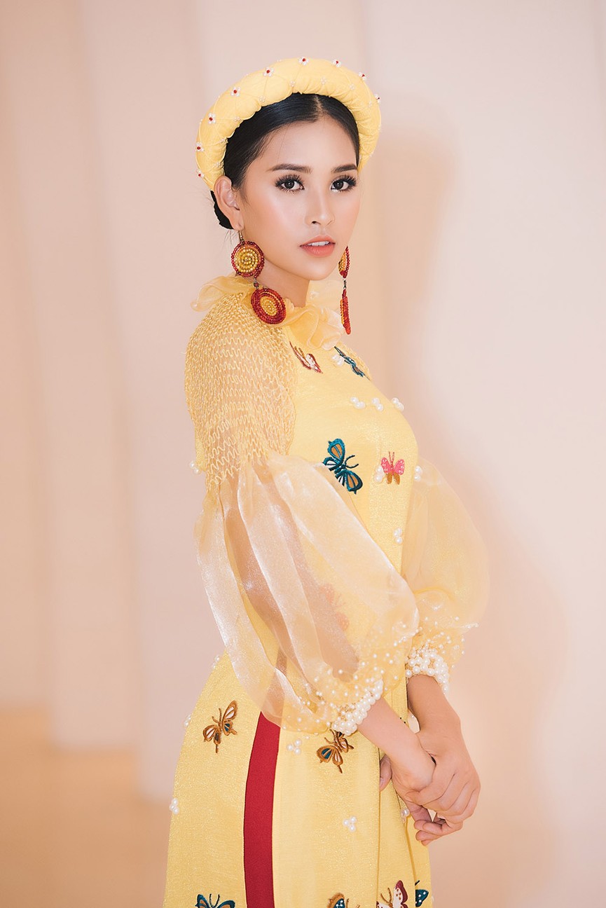 Hoa hậu Tiểu Vy đẹp mơ màng với áo dài, làm vedette sàn catwalk - ảnh 5