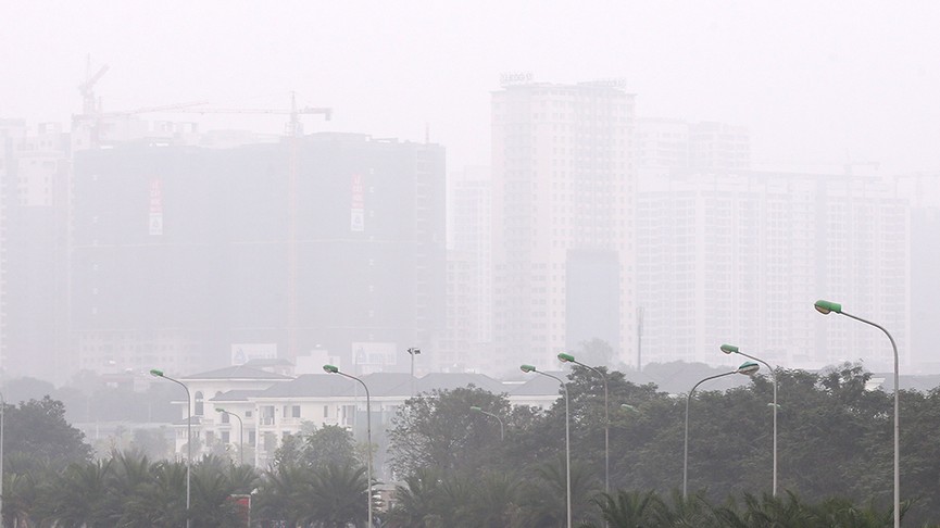 Cao ốc Hà Nội chìm trong sương mù dày đặc như Sa Pa - ảnh 10