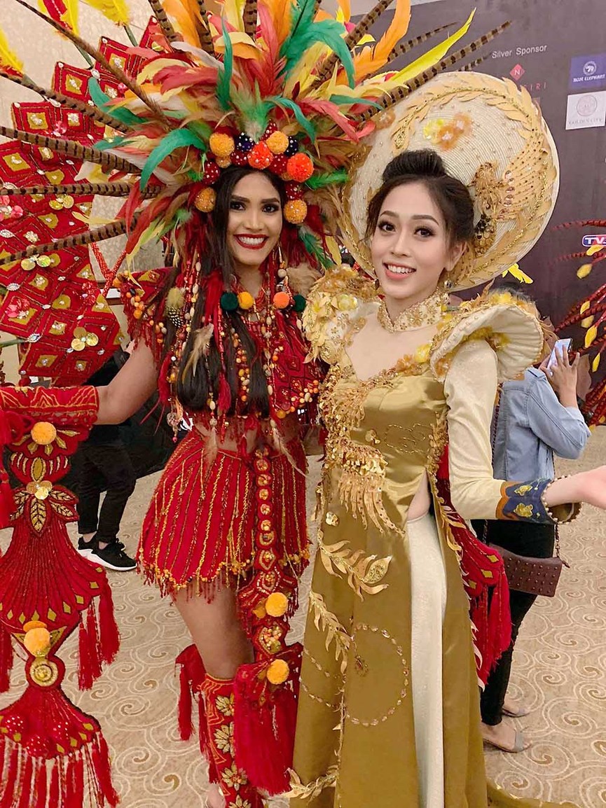 Phương Nga lộng lẫy trong hậu trường phần thi trang phục dân tộc - ảnh 9
