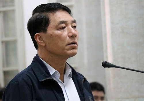 Cựu thứ trưởng công an Trần Việt Tân trong 1 lần hầu tòa. Ảnh: TTXVN
