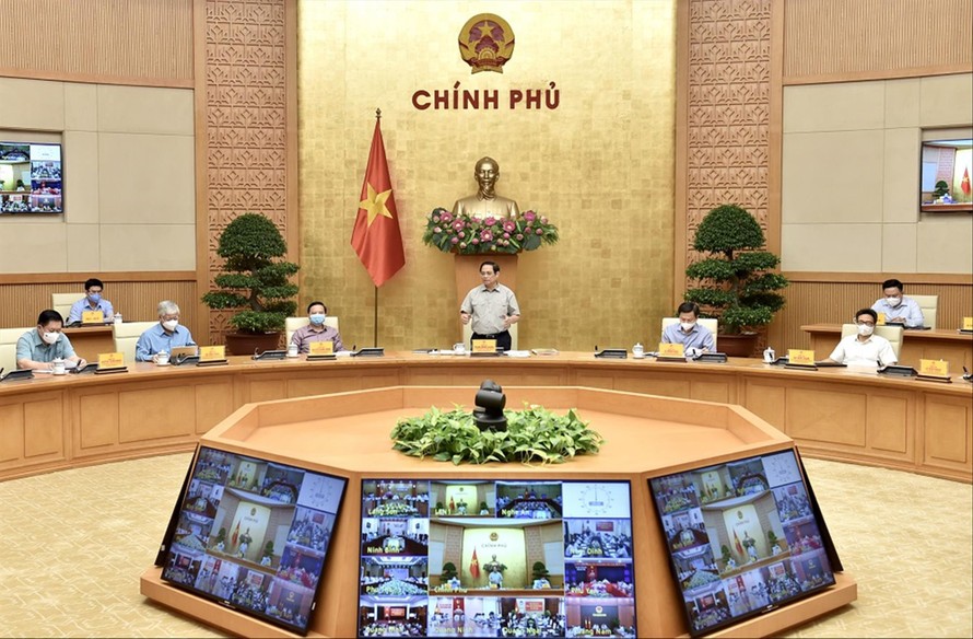 Thủ tướng Phạm Minh Chính chủ trì cuộc họp về phòng, chống dịch COVID-19. Ảnh: Nhật Minh