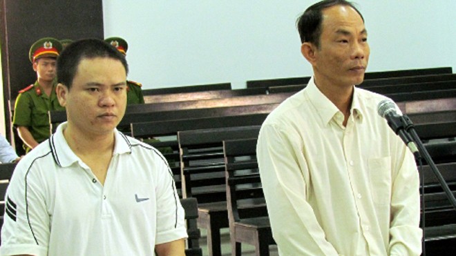 Bị cáo Luân Văn Nam và bị cáo Nguyễn Thành Trung tại phiên tòa ngày 12/9 