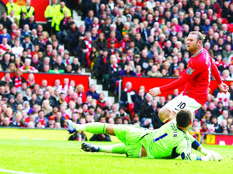 Rooney lập cú đúp mang lại ngôi đầu cho Manchester United Ảnh: PA