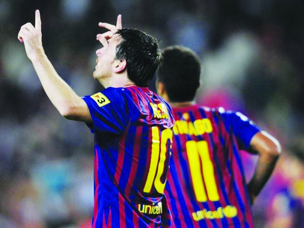 Lionel Messi không chỉ giúp Barca chiến thắng mà còn ghi thêm những kỷ lục mới vào bảng vàng cá nhân. Ảnh: Getty Image