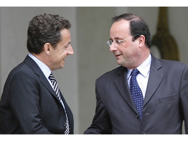 Tổng thống Nicolas Sarkozy (trái) và ứng viên Francois Hollande Ảnh: Paris Match
