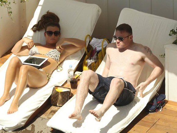 Rời Euro 2012, vợ chồng Rooney đến Mỹ tắm nắng