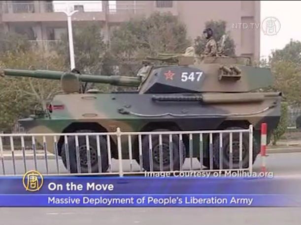 Xe tăng và pháo binh di chuyển rầm rộ trên đường ở Phúc Kiến. Ảnh do người dân chụp trong khoảng 3-2 đến 6-2