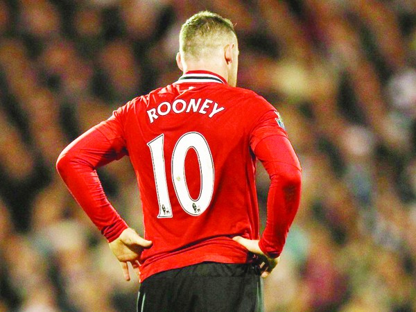 Nếu không biết giữ mình, Rooney có thể bị ông thầy Ferguson “sấy khô”. Ảnh: Getty Images