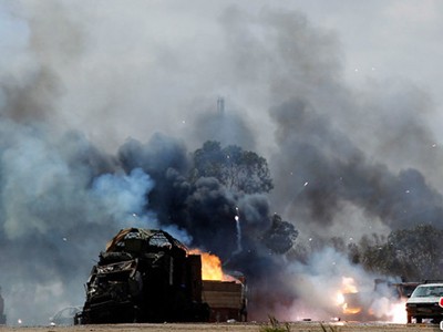 Dinh thự của Tổng thống Libya bị bắn cháy