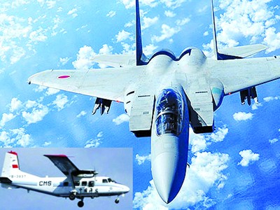 Nhật Bản nhiều lần điều chiến đấu cơ F-15 ngăn máy bay của Cục Hải dương Nhà nước Trung Quốc (ảnh nhỏ) Ảnh: Kyodo