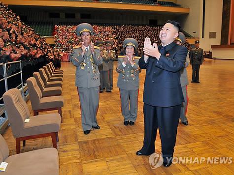 Ông Kim Jong Un trong lễ kỉ niệm 65 năm thành lập hai trường cách mạng