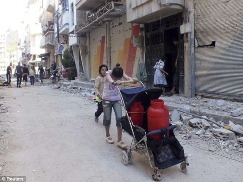 Lính Syria ‘bắn thai phụ, trẻ em để giải trí’?