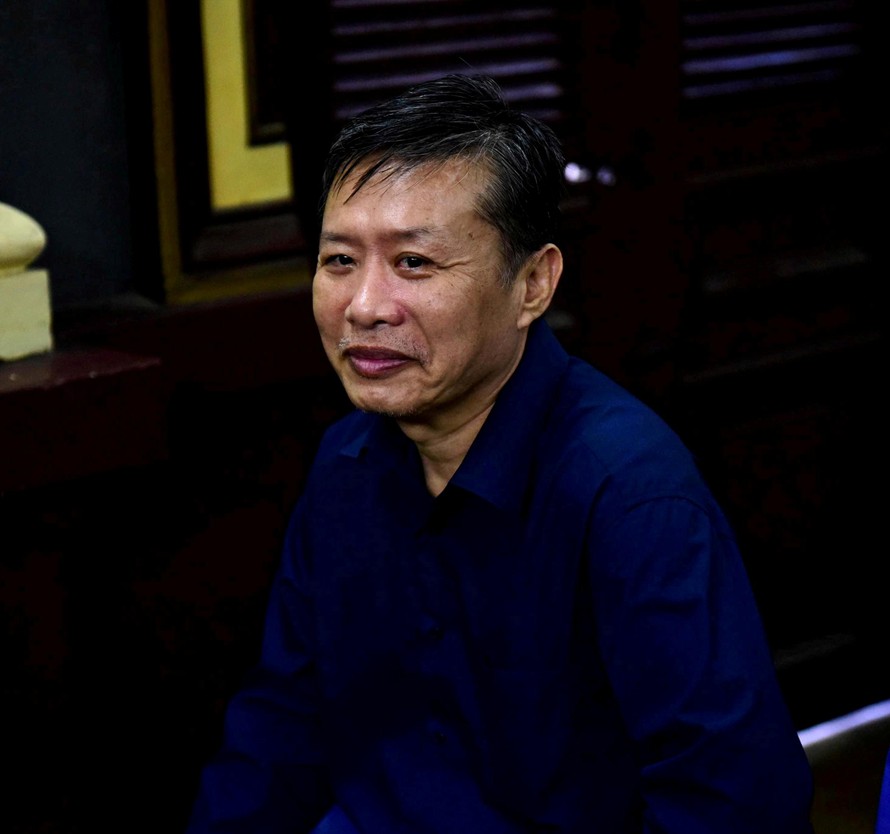 Cựu trung tá CA Nguyễn Hồng Anh tại tòa. Ảnh: Tân Châu