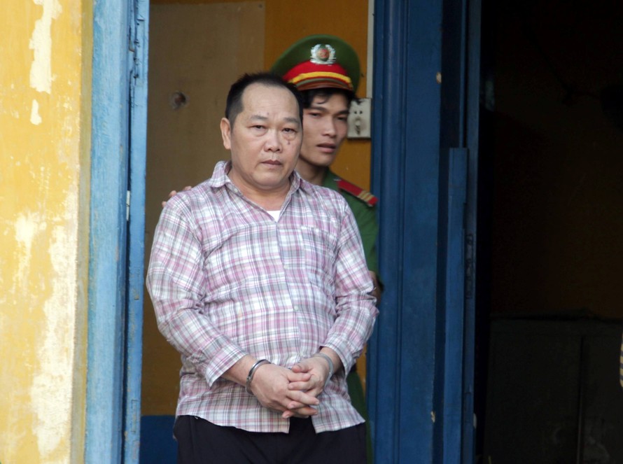 Cựu nhà báo Huỳnh Ngọc Long tại tòa chiều 25/3. Ảnh: Tân Châu.
