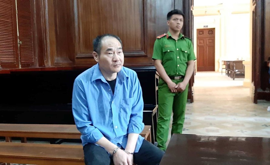 Ren Dan Jun - công dân Trung Quốc bị tòa án ở TPHCM xét xử vì trộm cắp tiền trên máy bay.