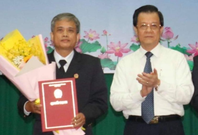 Tân Phó Chánh án TAND cấp cao tại TPHCM Bùi Đức Xuân (trái).