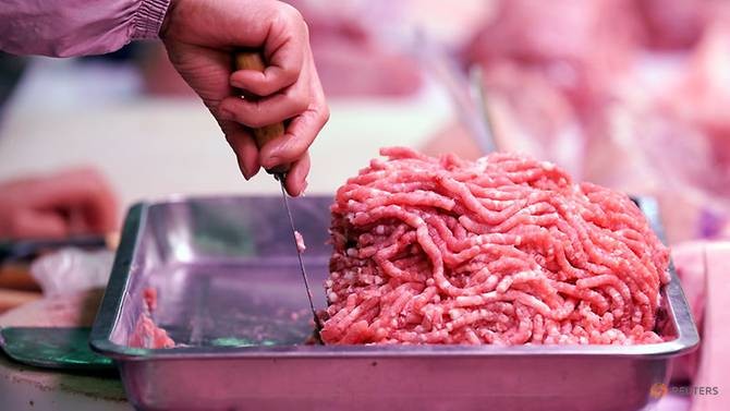 Thịt lợn được bán tại một chợ ở Trung Quốc ngày 26/12/2018. (Ảnh: Reuters)