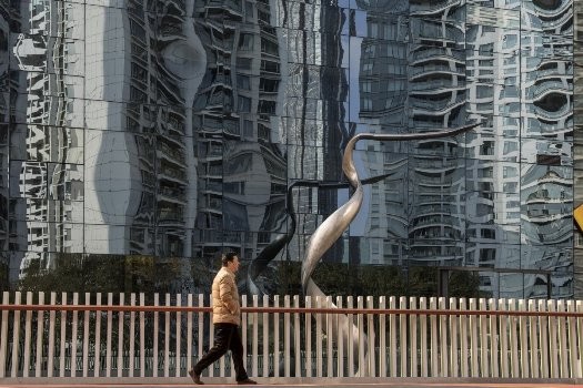 Một tòa nhà ở Thượng Hải. Có tin đồn kinh tế Trung Quốc năm nay chỉ tăng 1,5% chứ không phải 6,5% như công bố. (Ảnh: Bloomber)