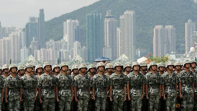 Lực lượng Trung Quốc đồn trú tại Hong Kong tại căn cứ hải quân đảo Stonecutters ngày 30/6/2019. (Ảnh: Reuters)
