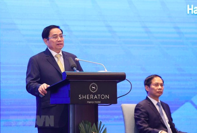 Thủ tướng Phạm Minh Chính phát biểu tại diễn đàn. (Ảnh: TTXVN)