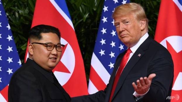 Chủ tịch Triều Tiên Kim Jong-un và Tổng thống Mỹ Donald Trump trước cuộc gặp thượng đỉnh tại Singapore. (Ảnh: Getty Images)