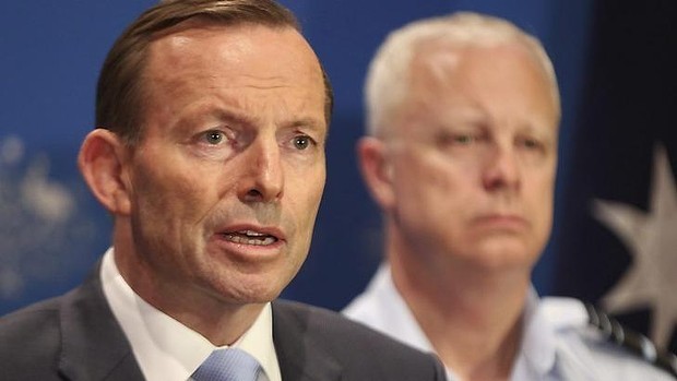 Thủ tướng Úc Tony Abbott (trái).