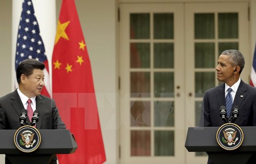 Tổng thống Mỹ Barack Obama (phải) và Chủ tịch Trung Quốc Tập Cận Bình (trái) tại cuộc họp báo chung ở Nhà Trắng ngày 25/9. (Nguồn: TTXVN).