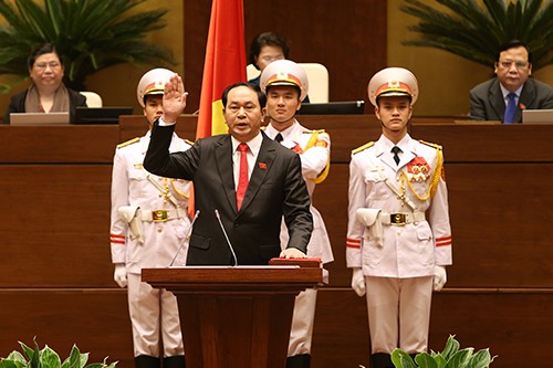 Tân Chủ tịch nước Trần Đại Quang tuyên thệ nhậm chức. Ảnh: Giang Huy/VnExpress
