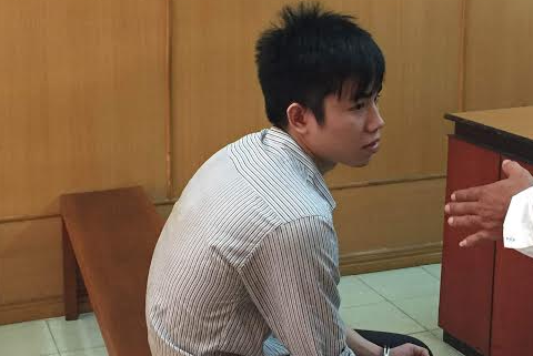 Phạm Đức Chung tại tòa ngày 21/4. Ảnh: Tân Châu.