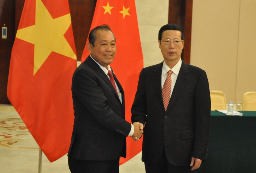 Phó Thủ tướng thường trực Trương Hòa Bình hội kiến Phó Thủ tướng Trung Quốc Trương Cao Lệ. Ảnh: TTXVN.