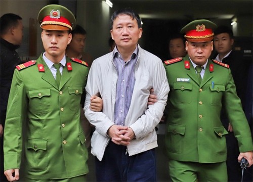 Ông Trịnh Xuân Thanh bị dẫn giải sau khi phiên sơ thẩm ngày 22/1 kết thúc. Ảnh: VnExpress.