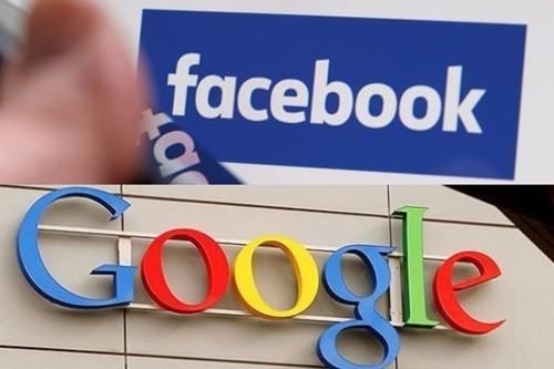Biểu tượng Facebook và Google. Ảnh: Reuters.