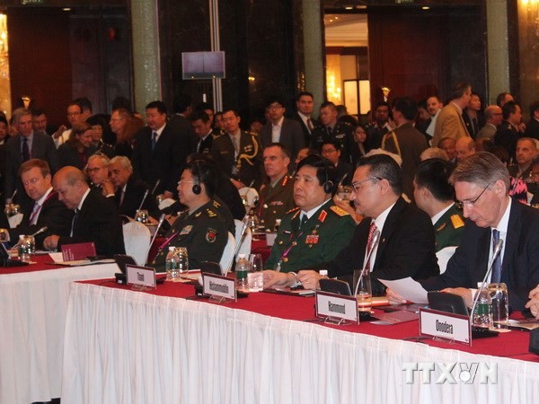 Bộ trưởng Bộ Quốc phòng Phùng Quang Thanh tại Shangri La lần thứ 13. (Ảnh: Lê Hải/TTXVN) 