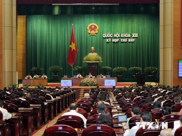 Quốc hội biểu quyết thông qua Nghị quyết về cân đối ngân sách trung ương và ngân sách địa phương năm 2013. (Ảnh: Lâm Khánh/TTXVN) 