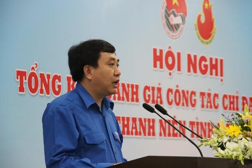 Đồng chí Nguyễn Mạnh Dũng, Bí thư thường trực BCH TW Đoàn TNCS Hồ Chí Minh báo cáo tóm tắt kết quả thực hiện năm thanh niên 2014.