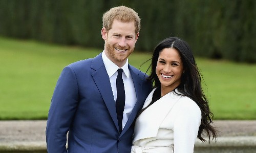 Hoàng tử Harry bên vợ chưa cưới. Ảnh: Standard. 
