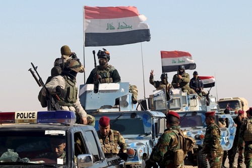 Các lực lượng an ninh Iraq được điều động đến khu vực biên giới với Arab Saudi ngày 17/2. Ảnh: Reuters.